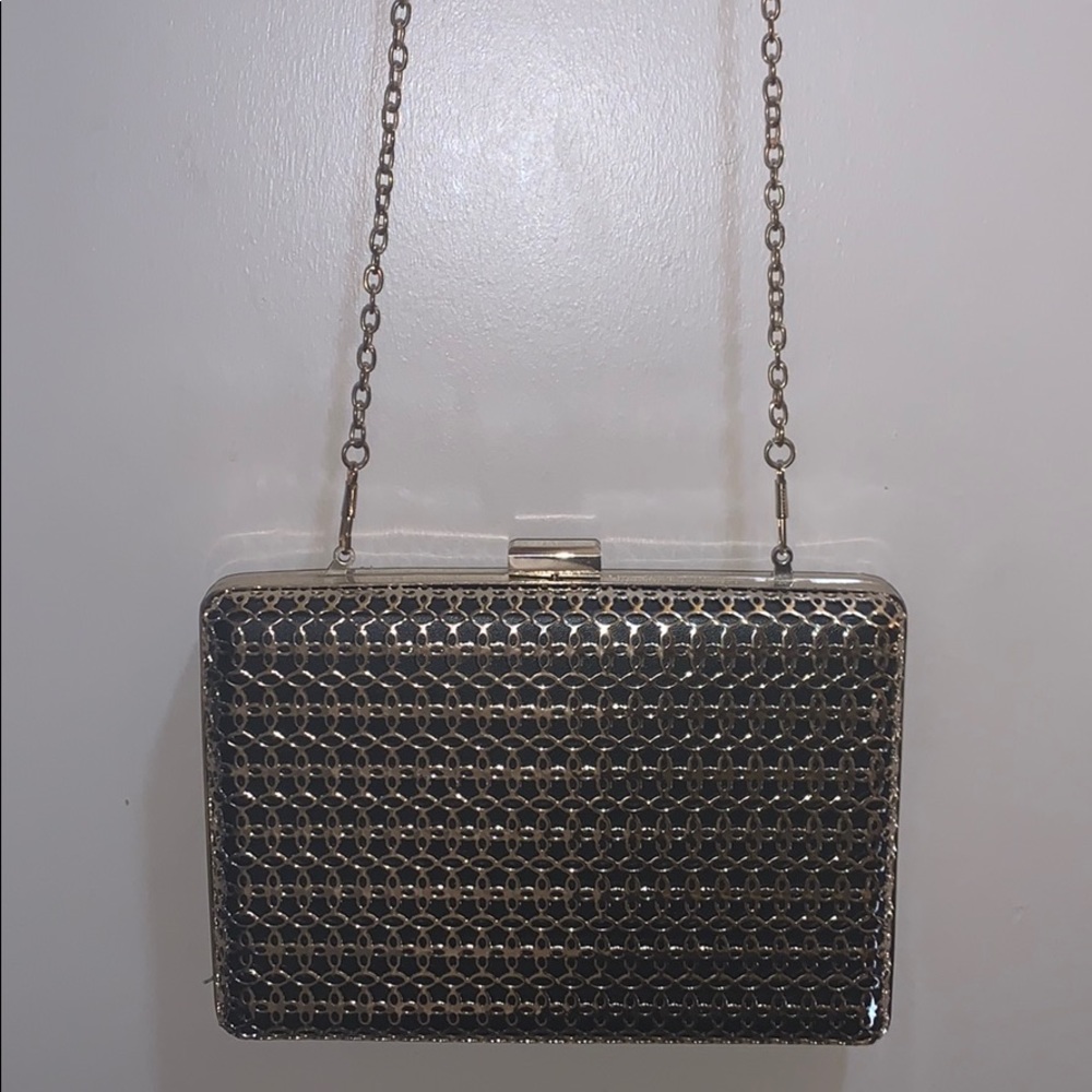 black and gold clutch bag
